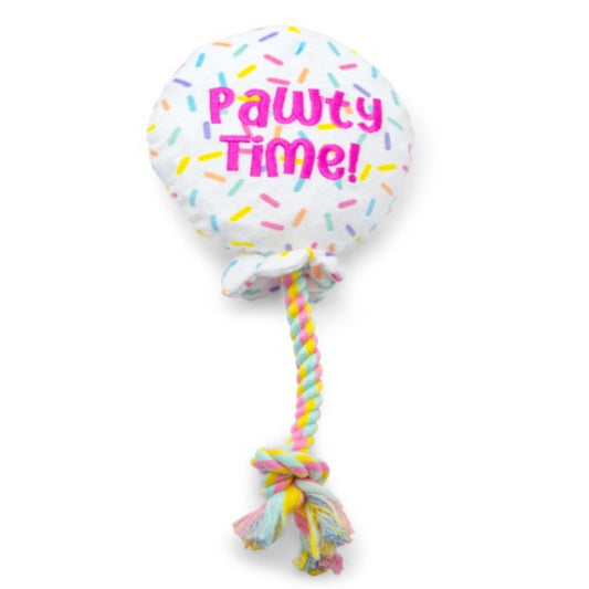 Dog toy with colorful balloon and rope on a white background